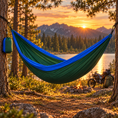Green and blue hammock at a sunset motorcycle campsite